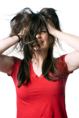 Young woman shaking her hair