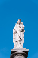 Russia, Blagoveshchensk, July 2019: Monument to the Holy mother of God against the blue sky