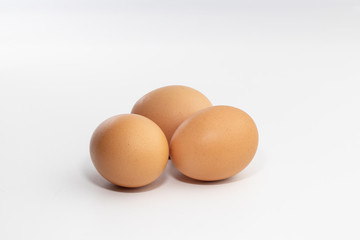 three eggs isolated on white background