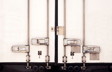 Security door of shipping container, road freight cargo transport.