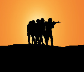 silhouette soldier with weapon during search terrorist on mountain
