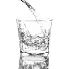 Water poured in a glass transparent isolated white background