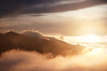 Dolomites fog sunset