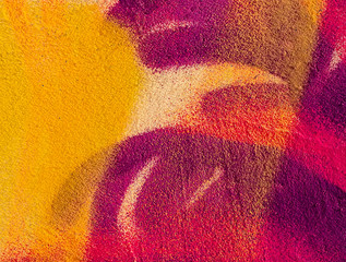 Beautiful bright colorful street art graffiti background. Abstract creative spray drawing fashion colors on the walls of the city. Urban Culture, pink , red , orange , yellow, crimson , purple texture