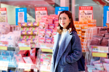 Asian Women shopping at the supermarket.