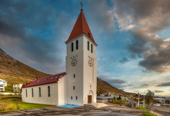 Naklejka premium Siglufjordur church. The picturesque city of Siglufjordur - Iceland