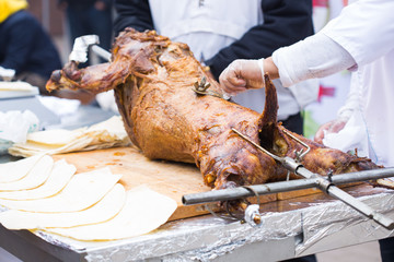 Grilled carcass lamb skewers close-up. Delicious Baked Meat at a food Festival.