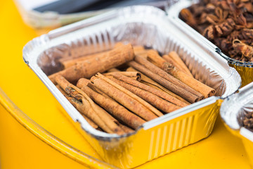 A lot of cinnamon sticks close up