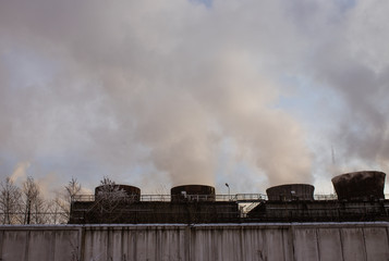 environmental pollution. smoke is coming. air pollution. pipes at the factory. Smoking pipes of...
