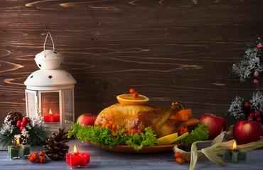 Fried Turkey for Christmas dinner, with berries, vegetables on a wooden table