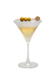 Martini cocktail with green olives on marble board. Close up.Classic glass of dry Martini with three olives isolate.