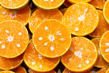 fresh orange with Orange cut in half to produce orange juice