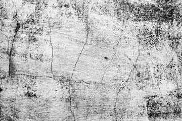 Texture of a concrete wall with cracks and scratches which can be used as a background