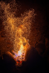 Sparks of a fire on a black background