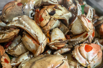 A plate of delicious spicy crab claws