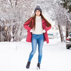 Fototapeta na wymiar Fashion young woman in the winter time