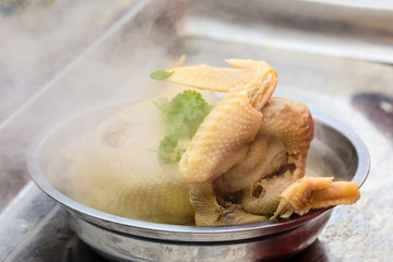 Delicious boiled chicken in bowl.Chinese food.
