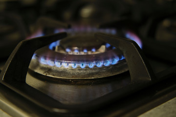 blue flames of gas stove