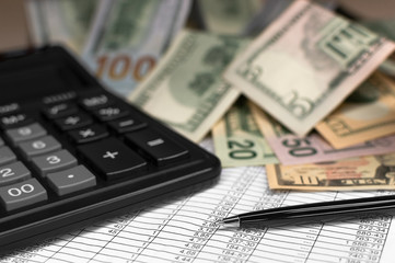 Accounting. Calculator, bills and pen. Business, finance conceptual.