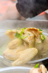 Delicious boiled chicken in bowl.Chinese food.