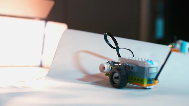 A robot made from a constructor runs into an obstacle.