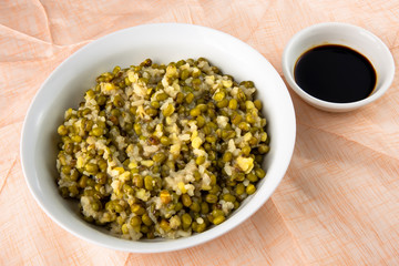 mung bean with white rice soup which is called Nokdujuk in Korea