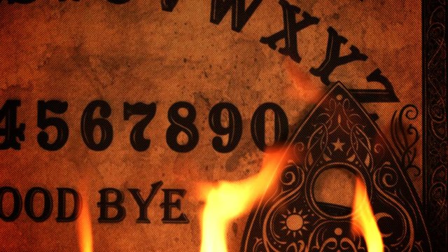Scary Ouija Spirit Board on Fire