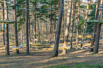 Amusement park in a pine forest. Great outdoor activities for people of all ages. Obstacle courses.