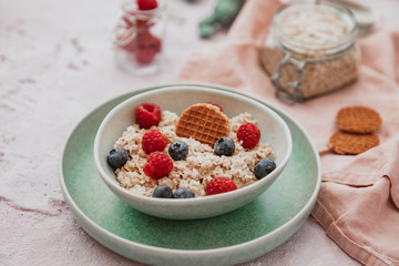 Delicious healthy breakfast - granola with berries on the table.