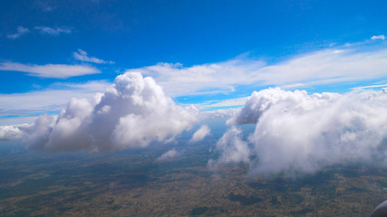 Blue sky with tiny clouds.