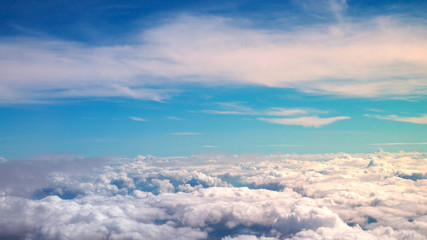 Fototapeta na wymiar Blue sky over tiny clouds. Sea clouds.