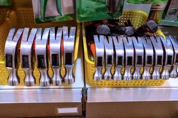New hammers work tool on shelf at hardware store.