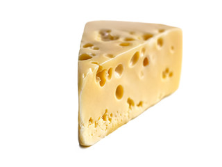 Piece of Maasdam cheese on a white background