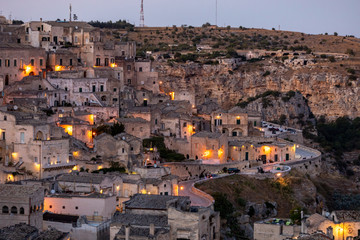 Naklejka premium View of the Sassi di Matera a historic district in the city of Matera, well-known for their ancient cave dwellings. Basilicata. Italy