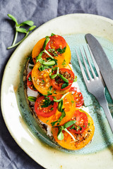 Toast with cheese and tomato slices on plate, top view. Vegetarian food concept.