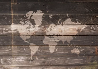 Abwaschbare Fototapete Weltkarte Weltkarte an einer Holzwand