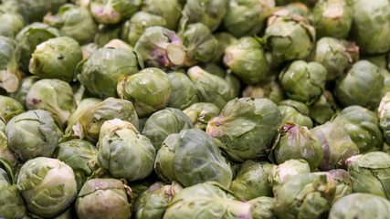 Fototapeta na wymiar group of fresh raw brussels sprouts on the market