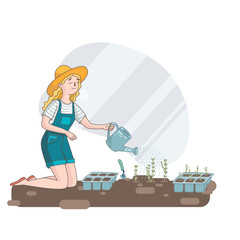 gardener watering sprouts, the girl is planting seedlings in the garden..works in the garden, planting