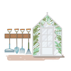 greenhouse with flowers inside. storing tools for working in the garden