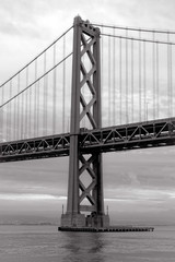 Oakland Bay Bridge Over Sea Against Sky