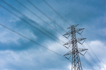 High voltage pole. Electrical power lines.