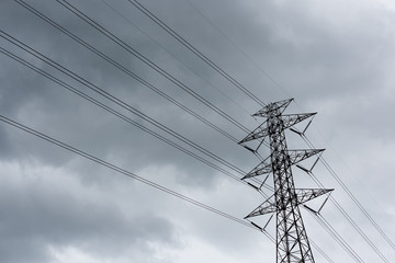 High voltage pole. Electrical power lines.