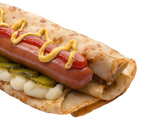 Pancake with sausage, mustard and pickled cucumber