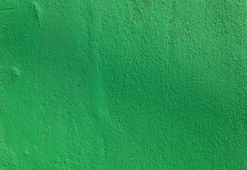 Green concrete wall surface abstract texture background with selective focus