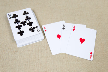 Playing cards of aces and deck playing cards face-up