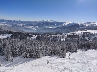Fototapeta na wymiar View of the winter mountains. Ski resort.