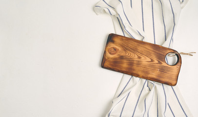 kitchen cloth napkin and kitchen board on white background with copy space