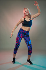 Fototapeta premium Fitness girl doing aerobic workout