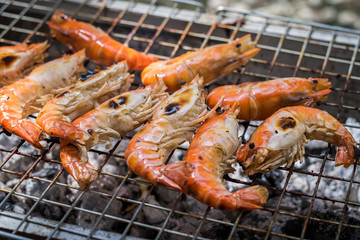 Shrimps on a flaming grill