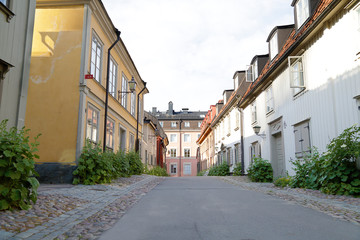 Fototapeta na wymiar Street with old wooden houses, Stockholm, Sweden